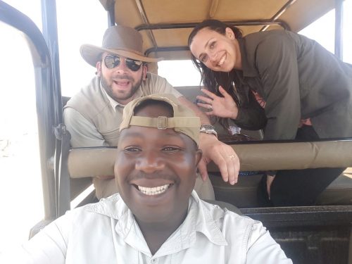 A Mbazi Safaris guide with guests on a custom safari experience